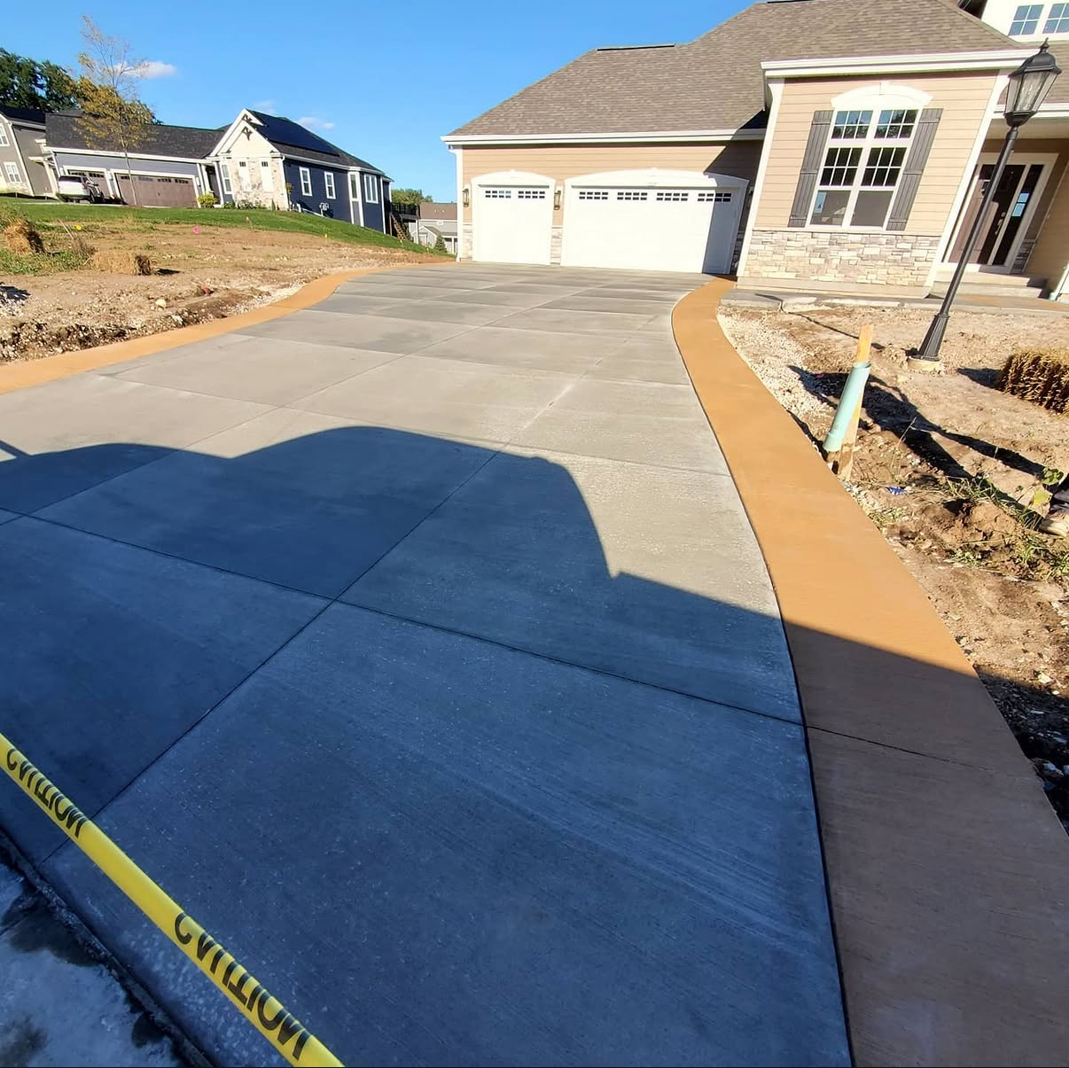 Custom paver driveway by Roman Brothers Landscaping — Southeast Wisconsin