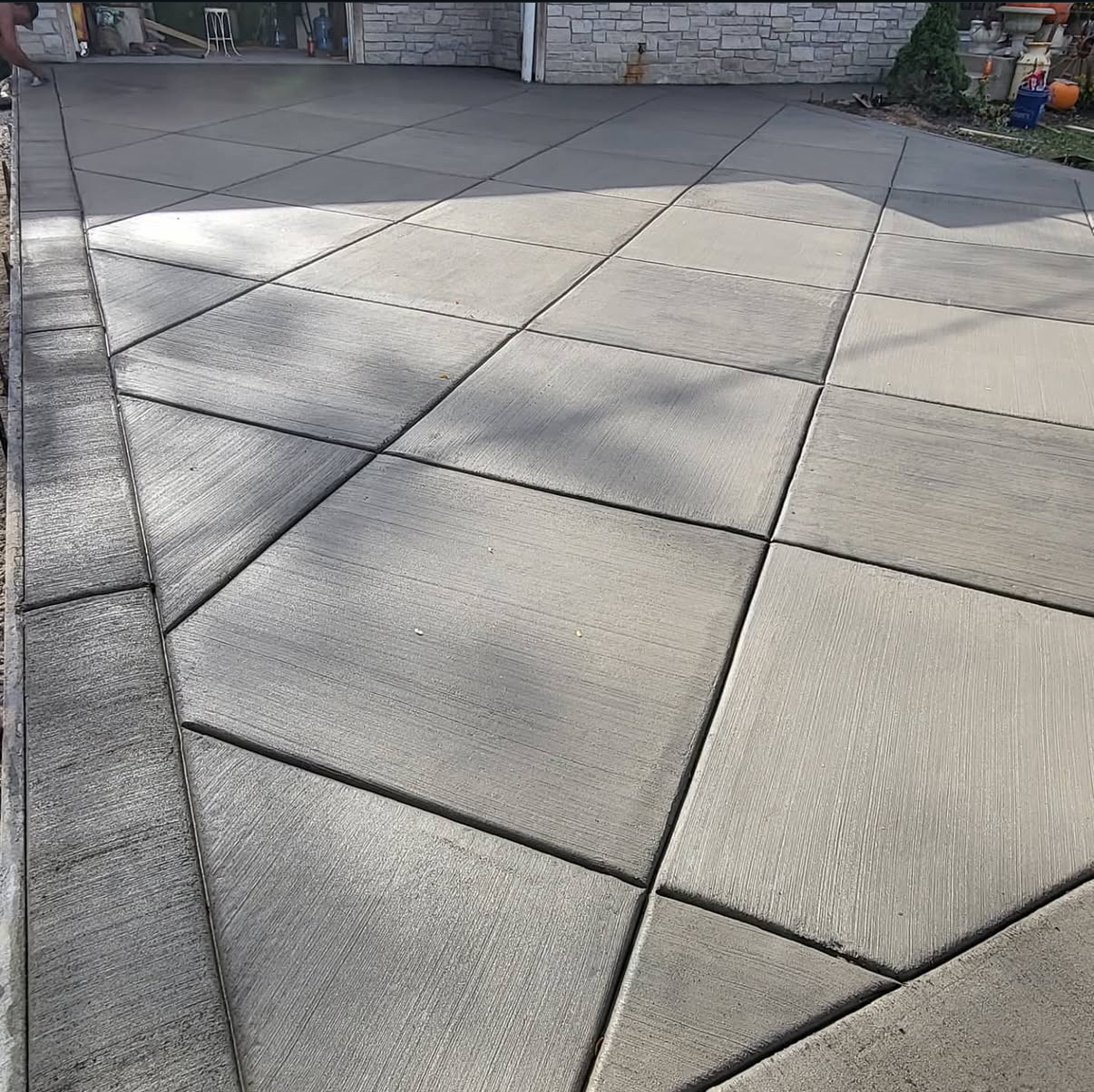 Custom paver driveway by Roman Brothers Landscaping — Southeast Wisconsin